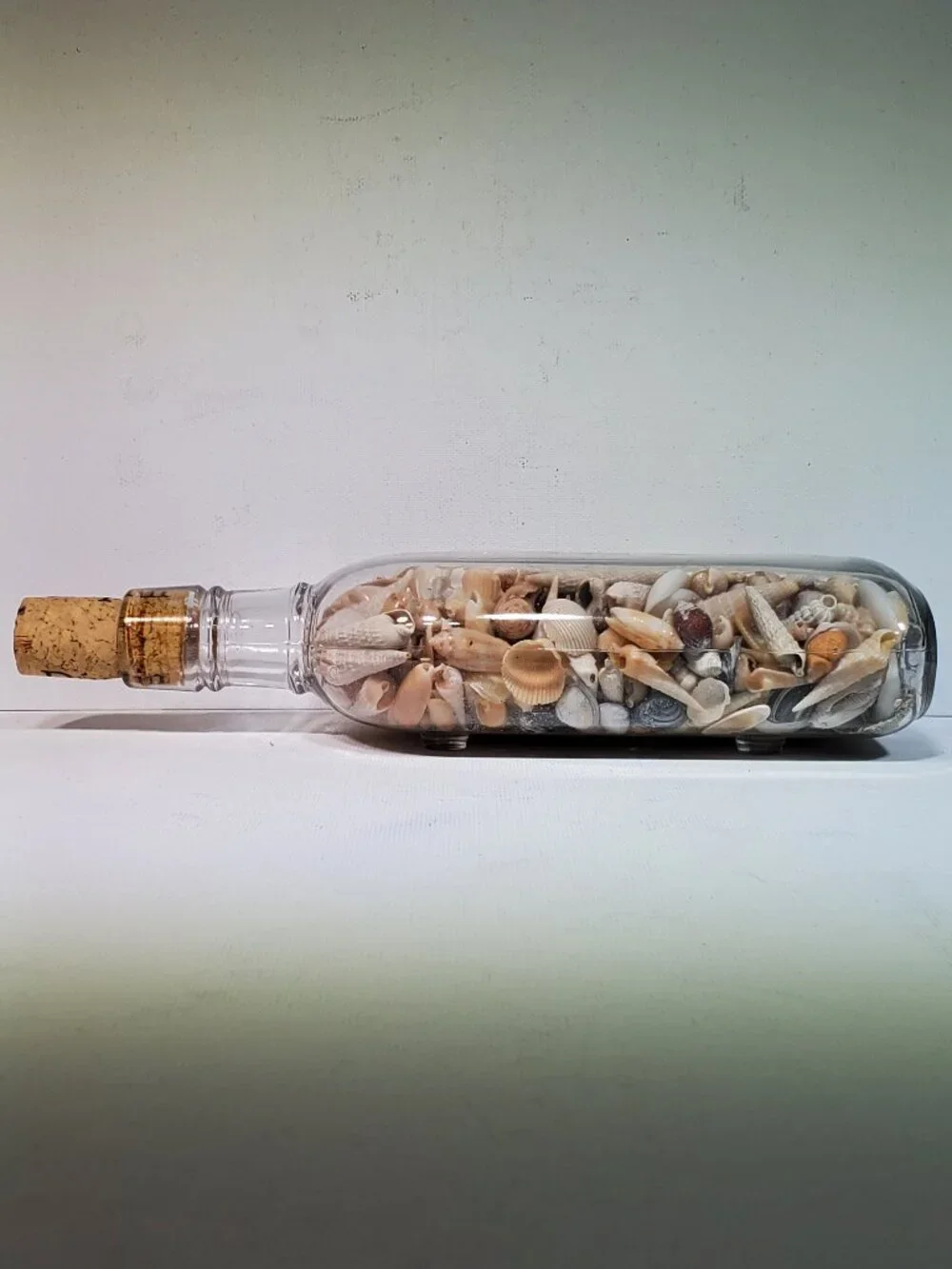 VINTAGE PINT CORK TOP BOTTLE WITH BEACH SHELLS FROM OCEAN DRIVE BEACH SC, 1990
